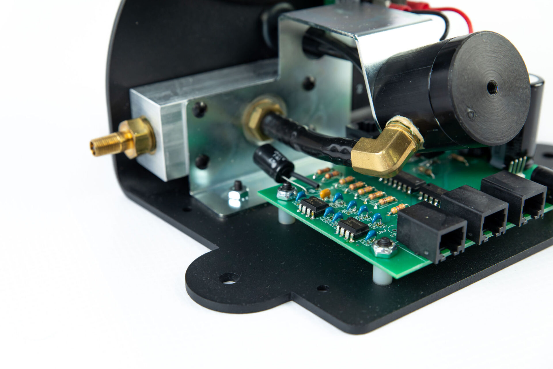 close up of electromechanical part with pcb board