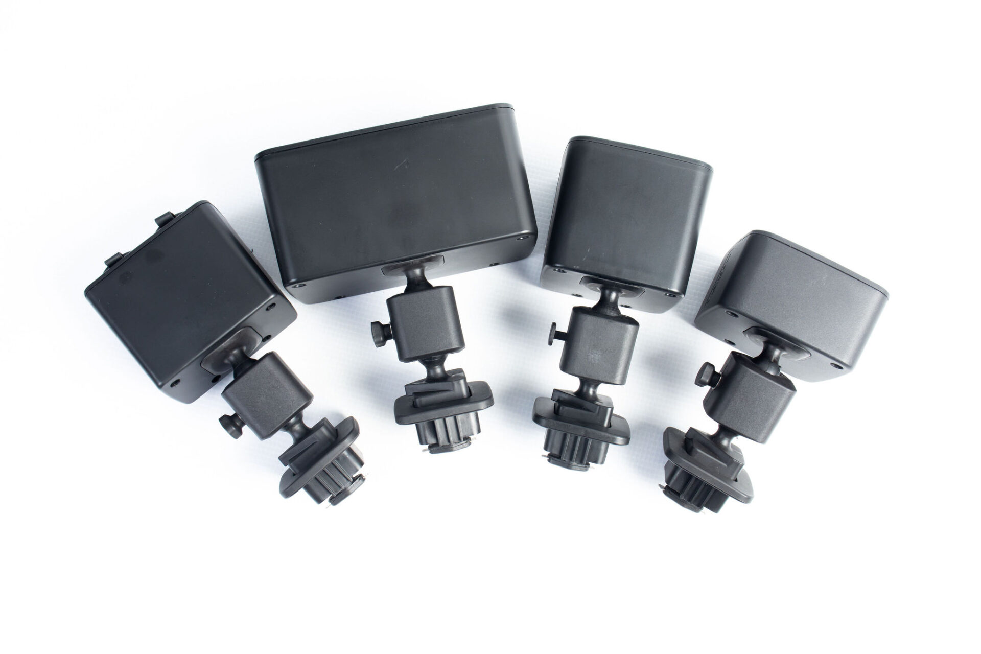 miscellaneous black plastic mounting devices
